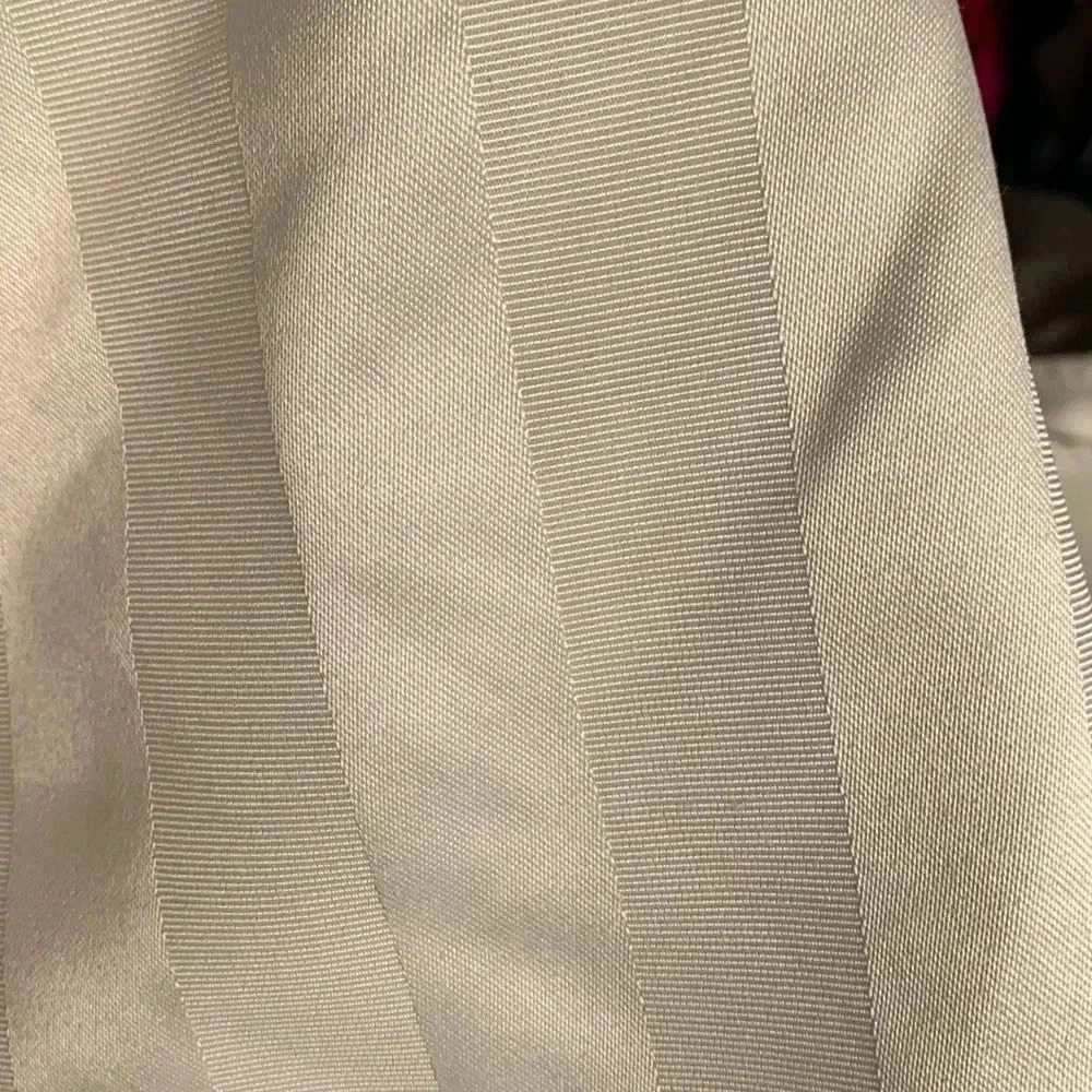 72” diameter round  ivory tablecloth, EUC